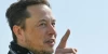 The Battle of Titans: Elon Musk's Visionary Approach vs. Warren Buffett's Conservative Strategy
